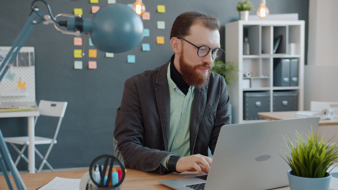 Borrower reading a loan agreement before accepting an offer